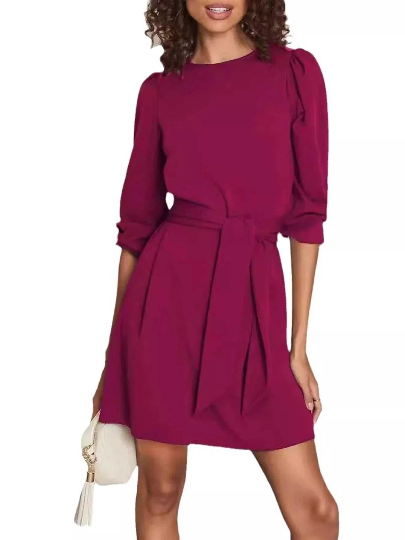 Black tie-waist mini dress with belted waist and no stretch fabric