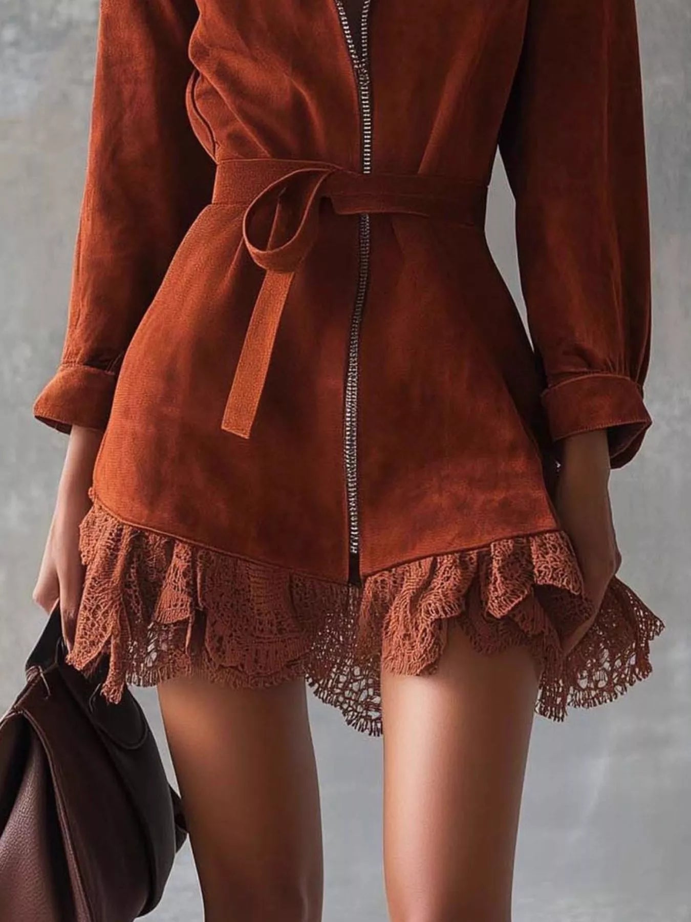 Black lace-trim zip front dress with belted waist and zipper closure