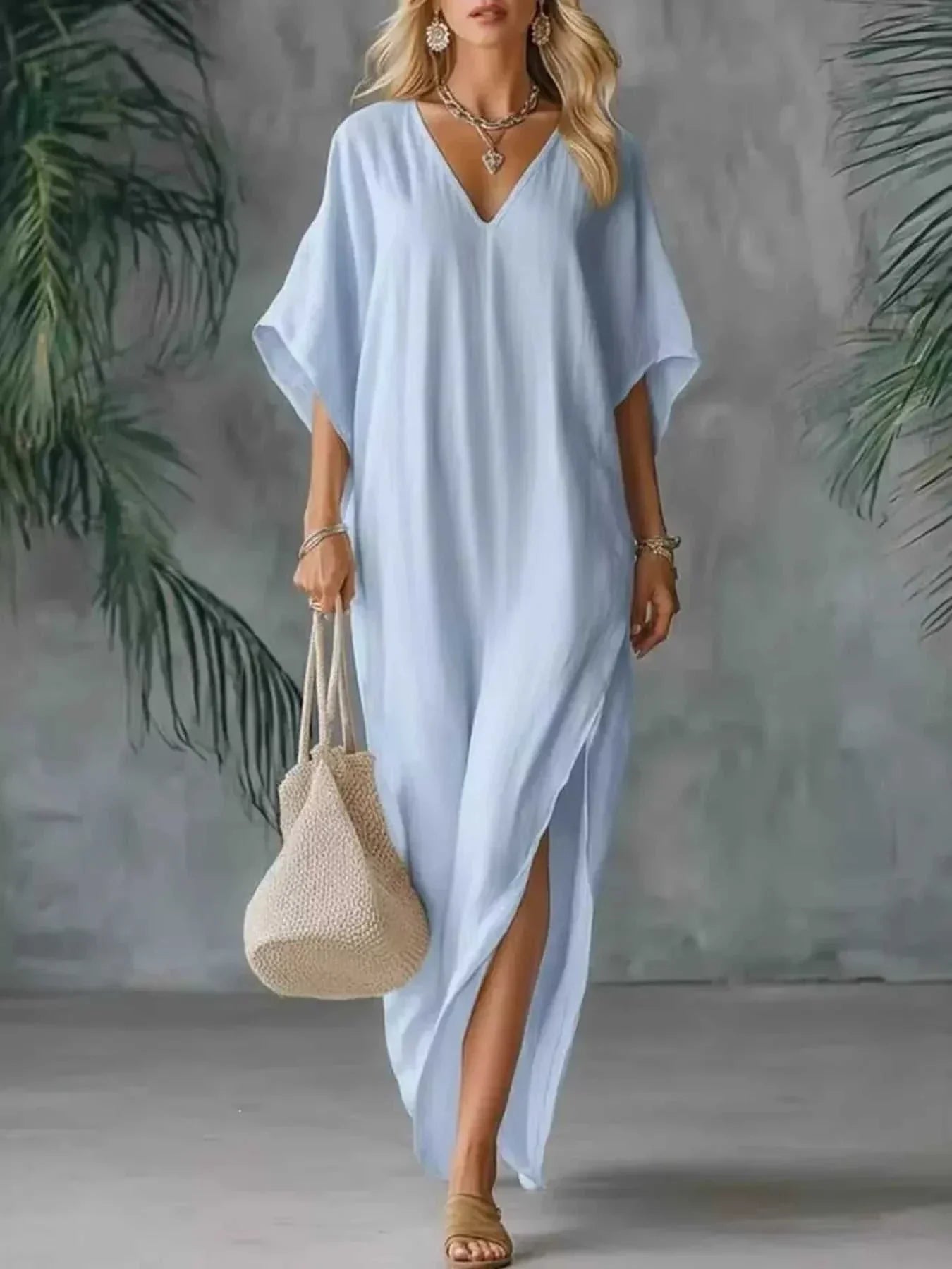 Plus size full size V-neck maxi dress with side slits and slightly stretchy polyester fabric