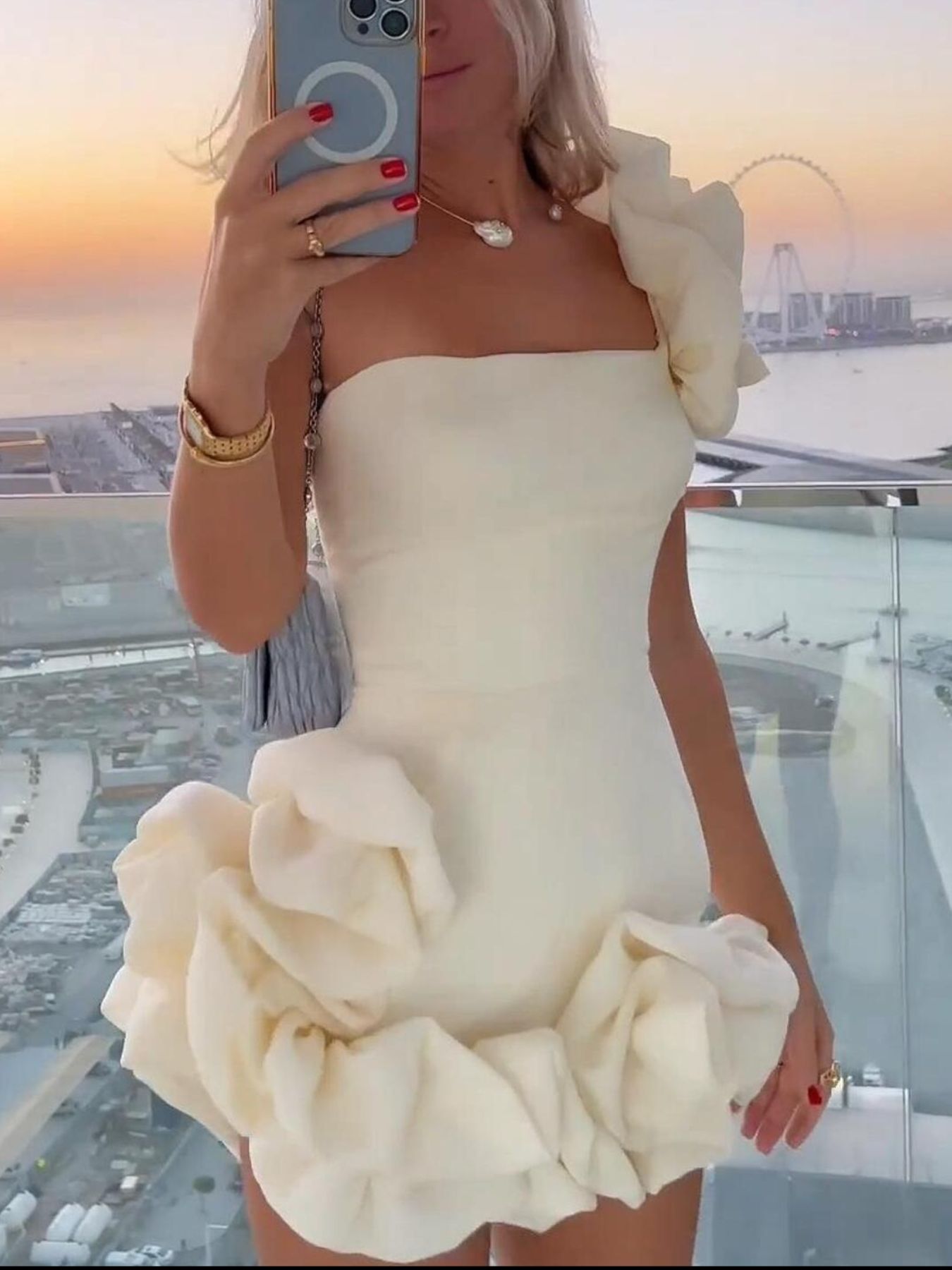 One-shoulder ruffle mini dress in polyester-spandex blend, slightly stretchy and machine washable