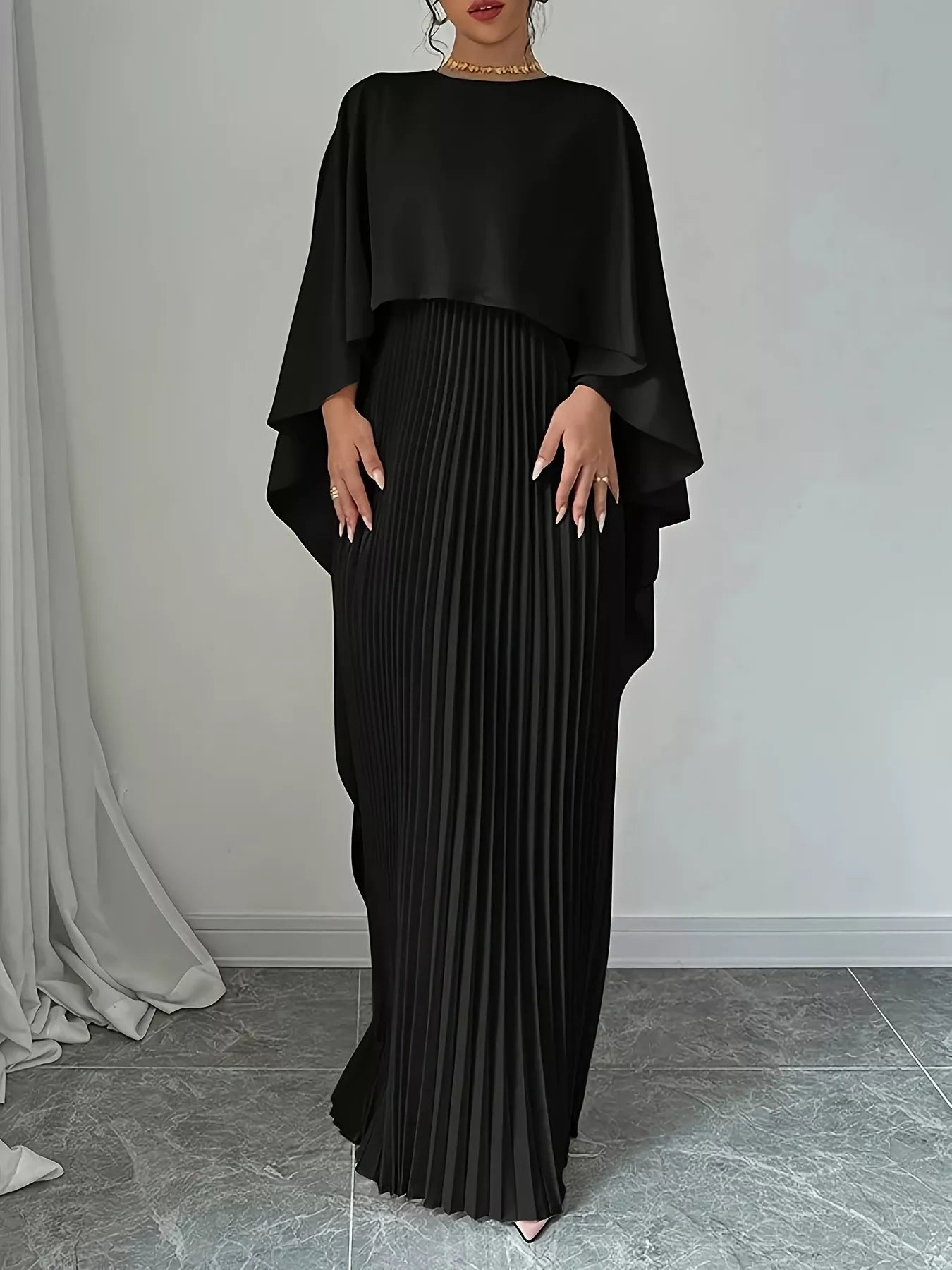 Cape pleated maxi dress in 100% polyester with no stretch and machine washable