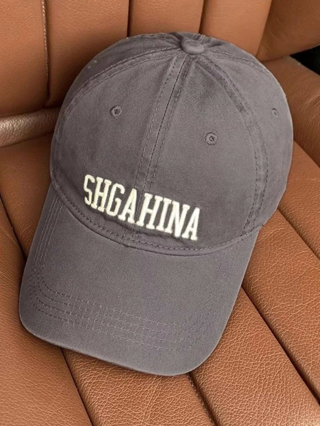 Embroidered letter baseball cap made of cotton with one size measuring 5.1 inches in height