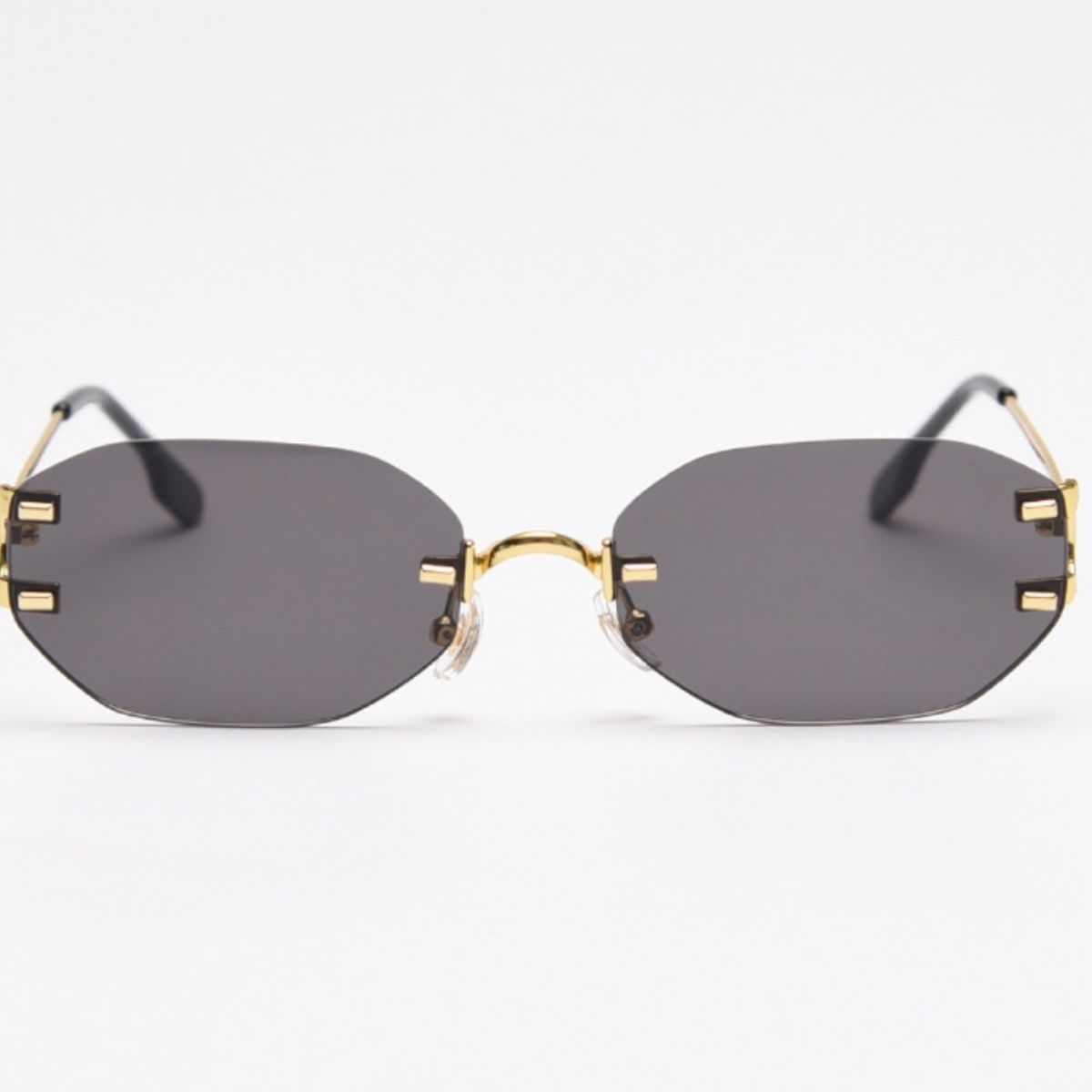 Rimless oval sunglasses with gold metal frame and UV400 protection
