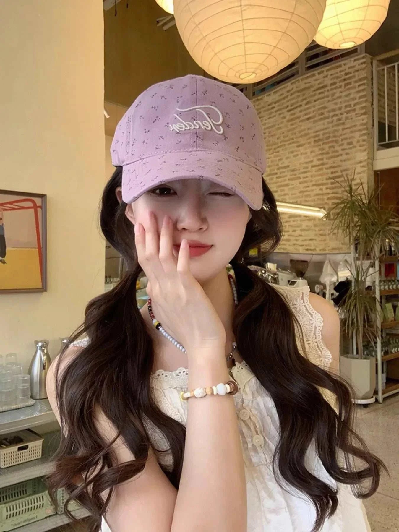 Floral embroidered cotton baseball cap with one size fitting and 4.7 inch height