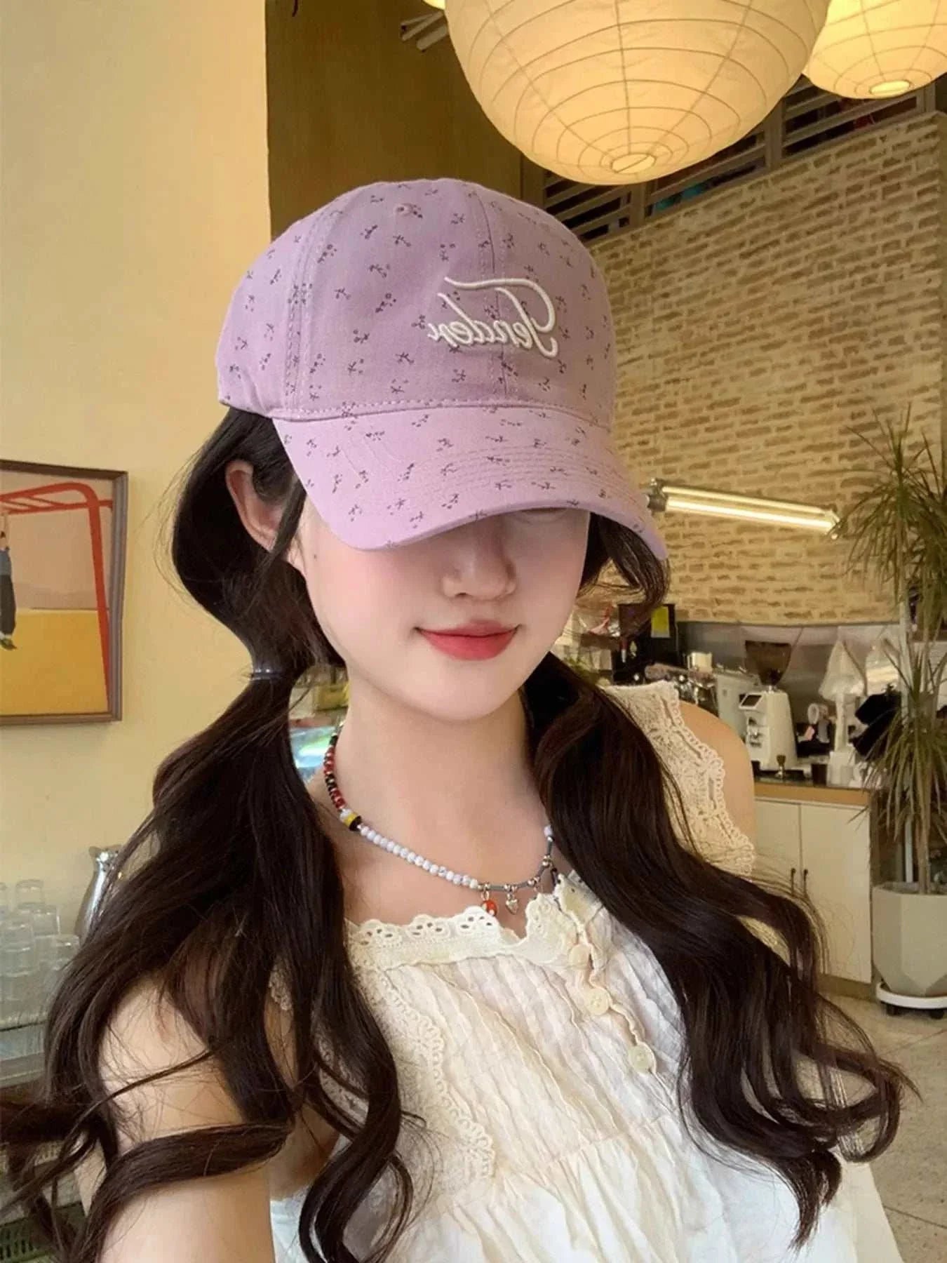 Floral embroidered cotton baseball cap in one size with 4.7 inch height