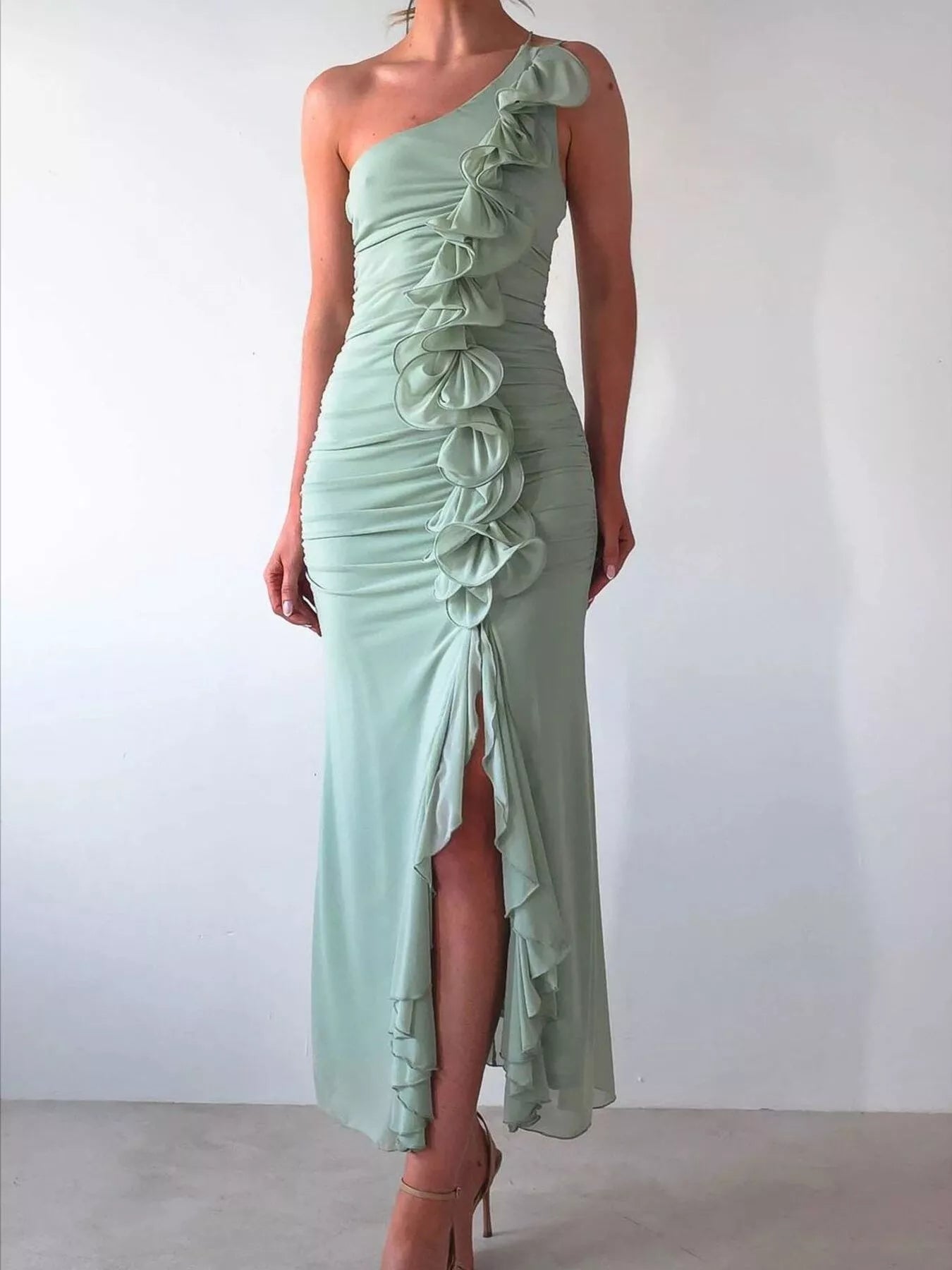 One-shoulder ruffle slit dress with zipper and ruched detail in polyester fabric