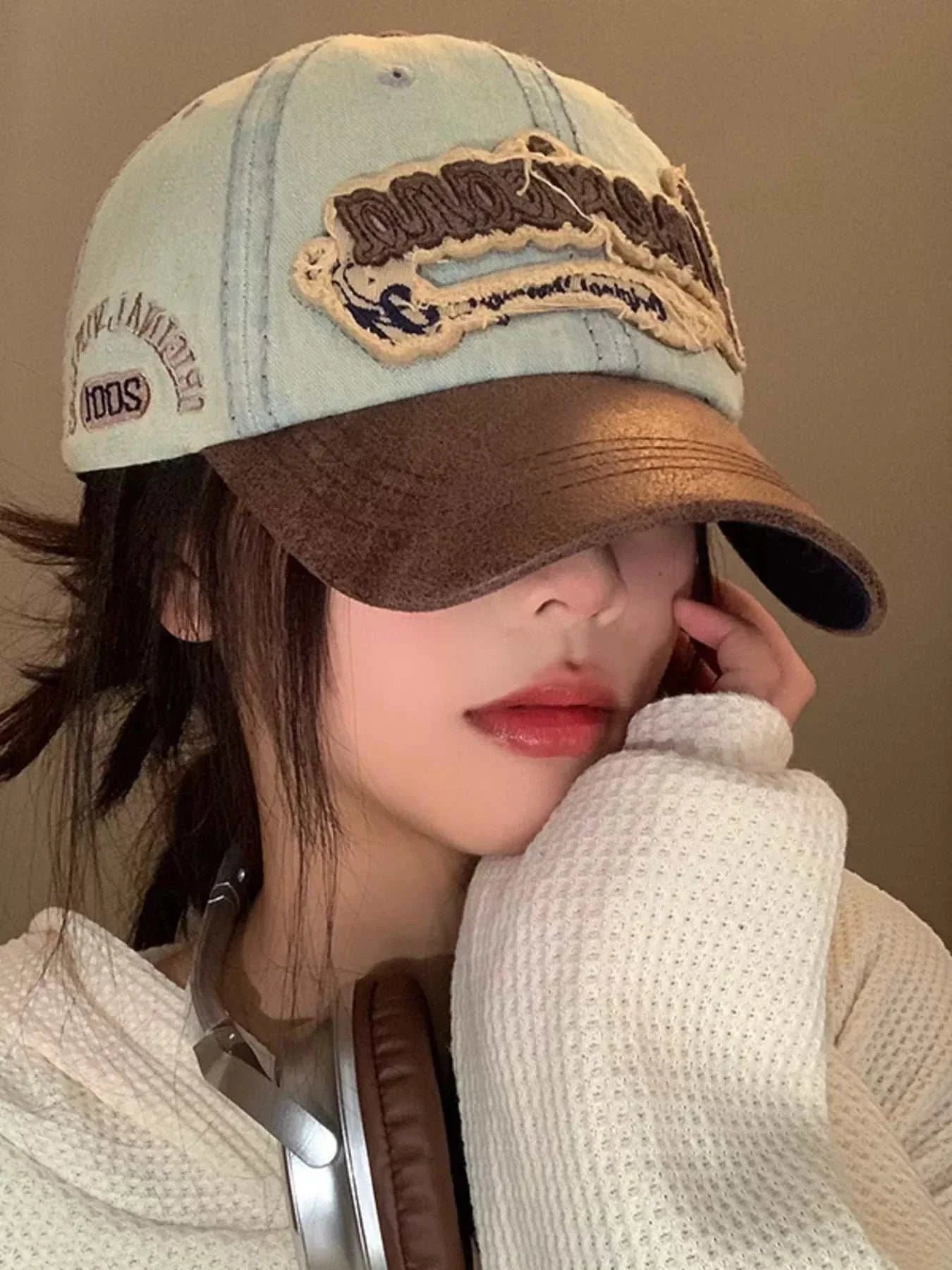 Vintage washed embroidered denim baseball cap with one size fit and 4.7-inch height