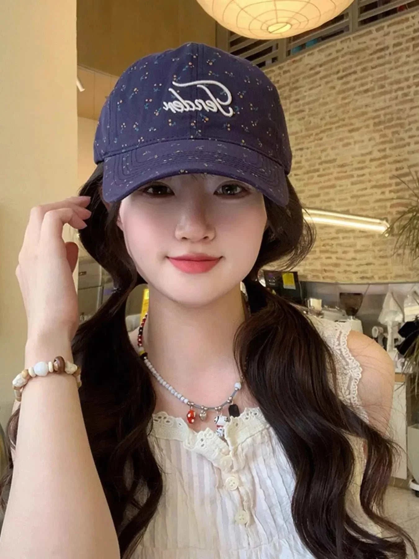 Floral embroidered baseball cap made of cotton with one size fits all and 4.7-inch height