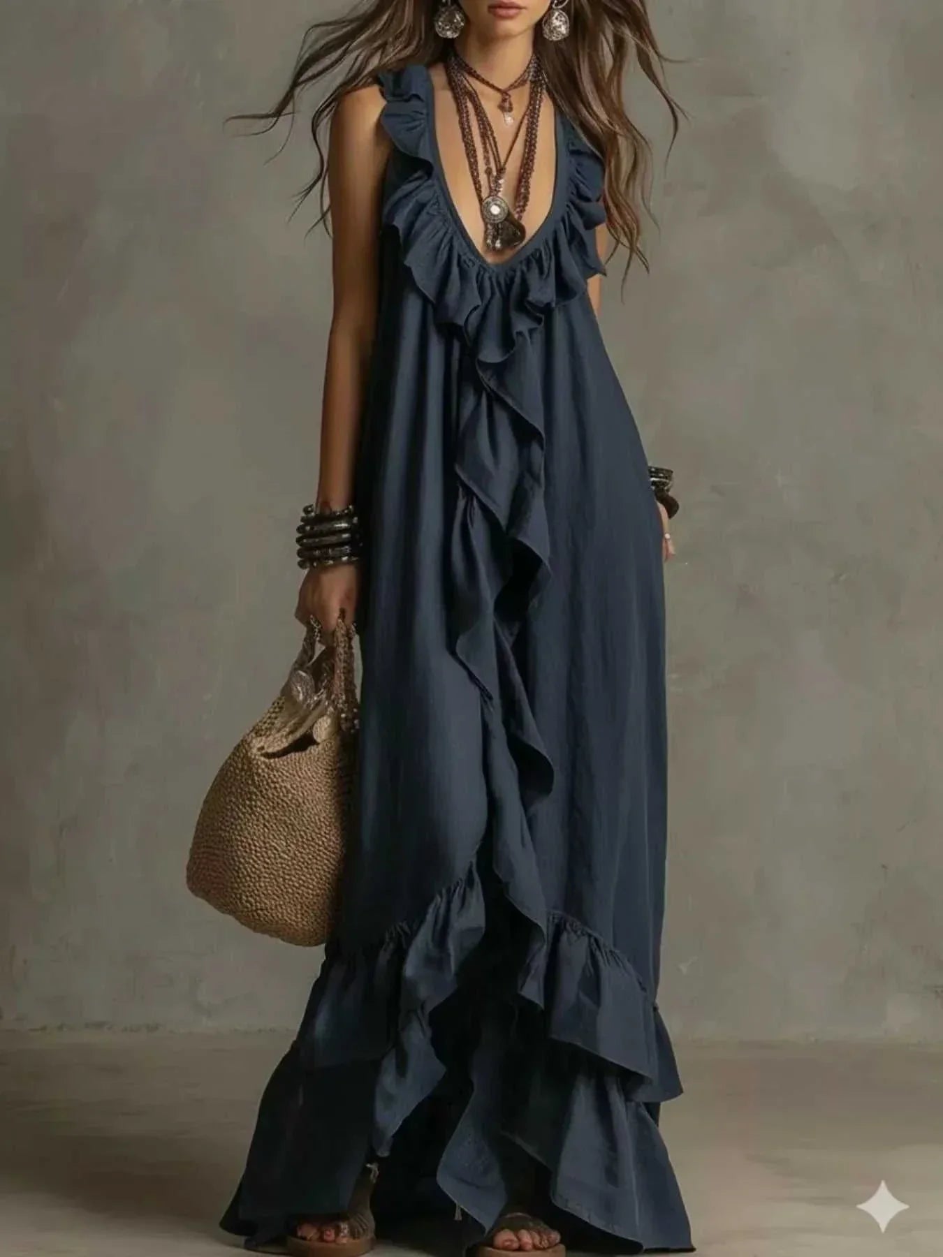 Ruffled sleeveless maxi dress in polyester fabric with no stretch and machine washable