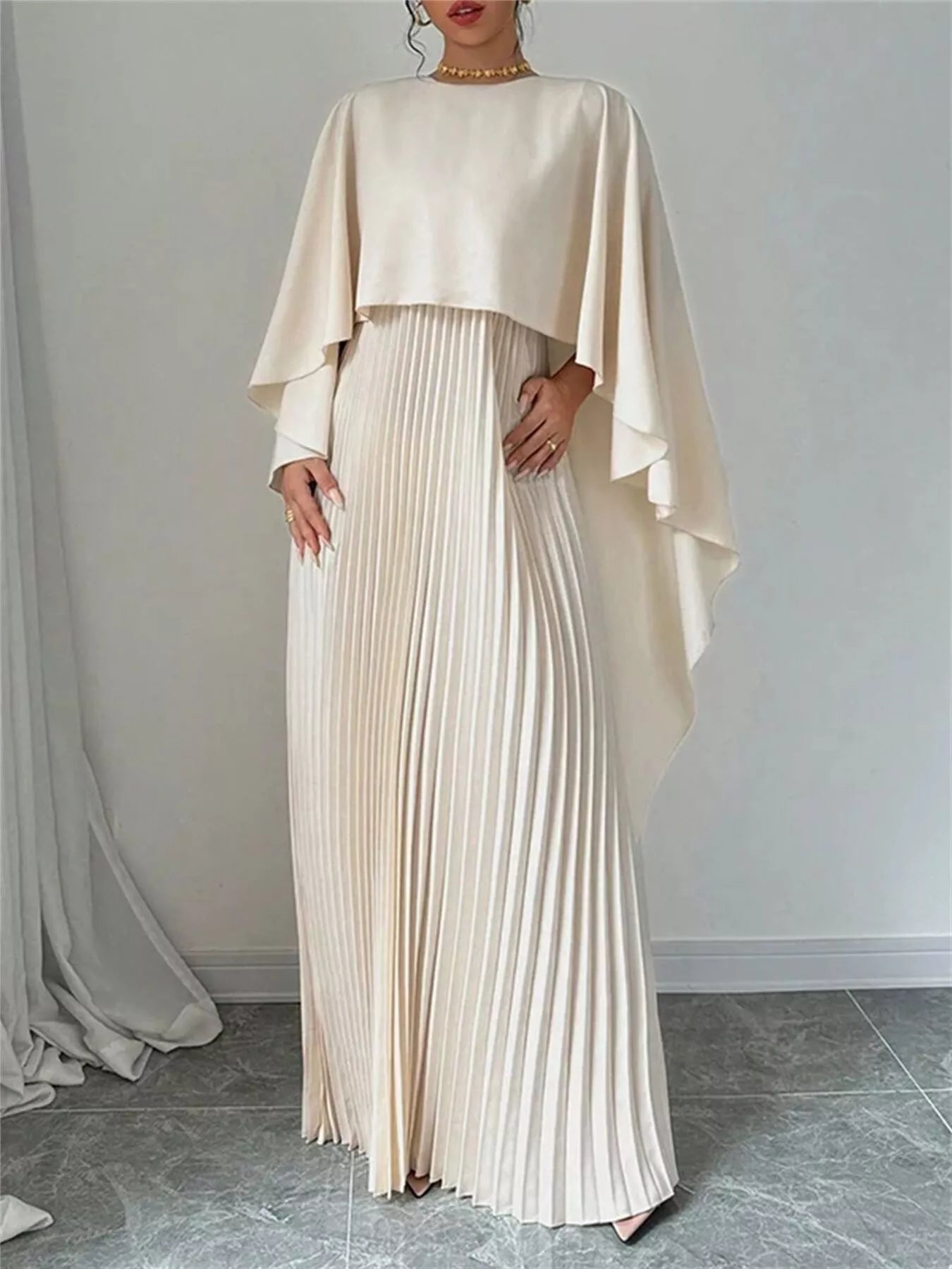 Cape pleated maxi dress with no stretch, 100% polyester, and pleated design